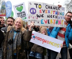 Activists pose during a climate change rally prior to the IPCC Paris Meeting in 2015.